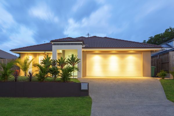 well lit house at night